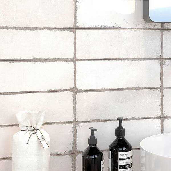 Artmore Tile Coronado White 4-in x 12-in Polished Ceramic Encaustic Thinset Mortar Wall Tile - Image 4