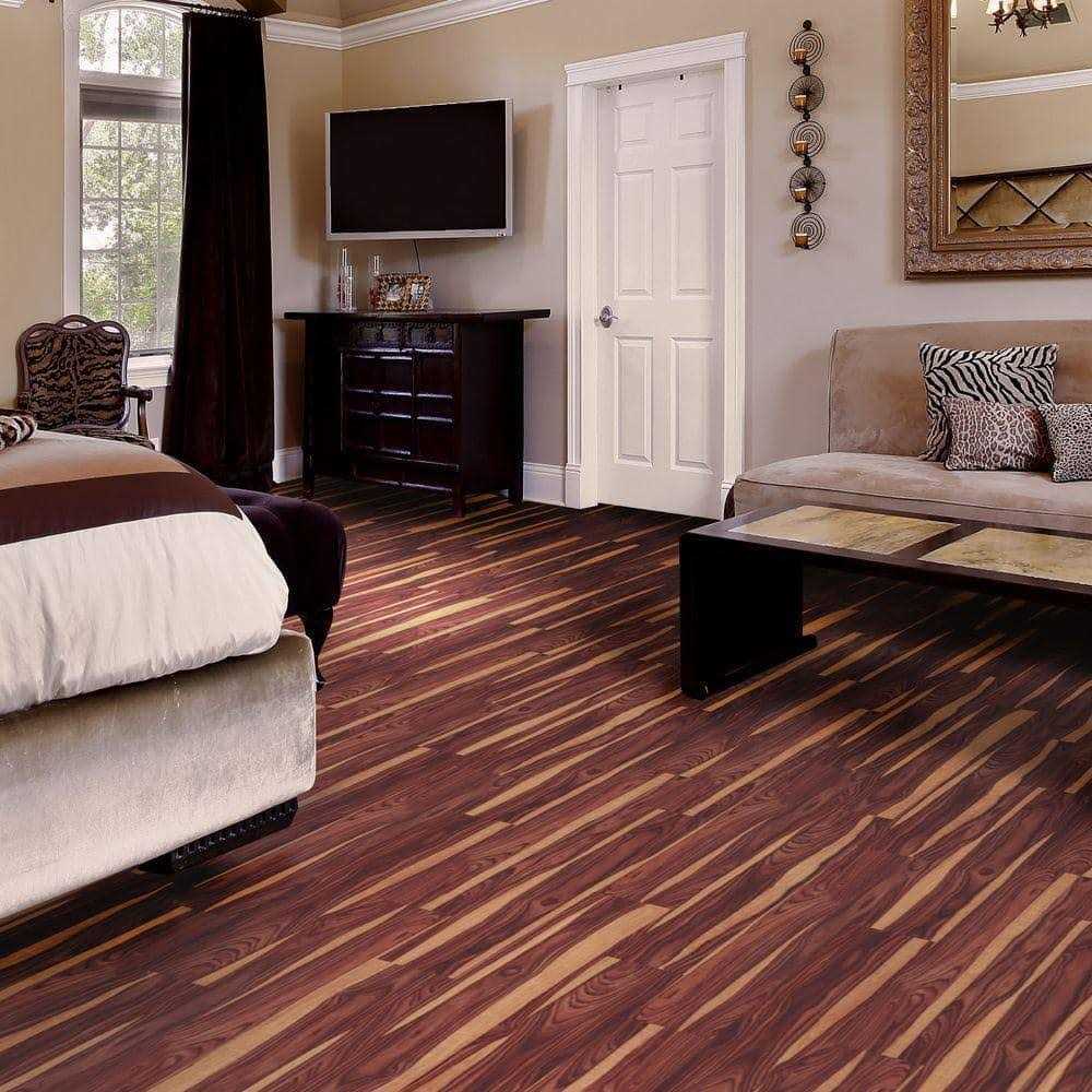 TrafficMaster African Wood Dark 4 MIL x 6 in. W x 36 in. L Grip Strip Water Resistant Luxury Vinyl Plank Flooring - Image 3